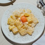Egg yolk and rigatoni carbonara