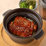 Eel and rice cooked in clay pot with broth