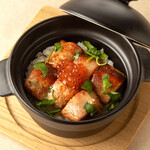 Salmon belly rice in clay pot