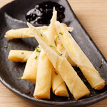 Cheese sticks with blueberry jam
