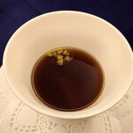 レストラン FONTANA - 越後米豚、ラビオリ、蕗の薹、ジャンボンブイヨン