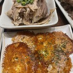 餃子と牛たん 居酒屋おおとら - 酢もつ＆蓮根チーズ焼