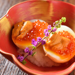 Soft-boiled egg marinated in miso topped with sea urchin roe
