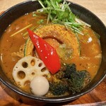 Garaku - チキンレッグと野菜カレー