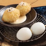 Soft-boiled quail eggs with truffle salt