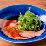 Roast beef simmered in a sauce with Edona and watercress