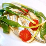 Italian Cuisine Nanbanzuke with silver-striped round herring and wild garlic