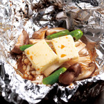 Grilled mushrooms in butter foil