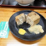 Udon Komugiya - おでん(豆腐)¥150内　甘味噌とカラシあり