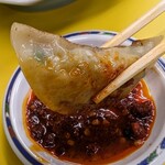 味心 - 辛味ダレをたっぷり絡めながら