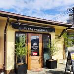 PIZZA PARADISE - 入口が変わりました。オリーブの木がお迎えします。