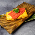 Red-colored egg roll topped with cod roe, Hakata Kanefuku