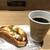 ブーランジェリー マルシェ - 料理写真:バジルソーセージとブレンドコーヒー