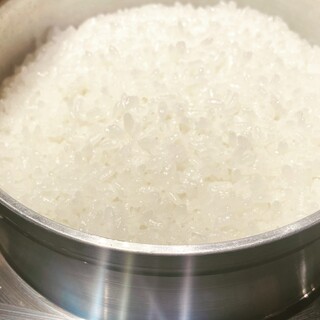 Freshly steamed rice made from Ebino-produced "Masayuki rice" cooked in a pot.