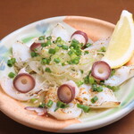 Grilled water octopus with green onion and sesame salt