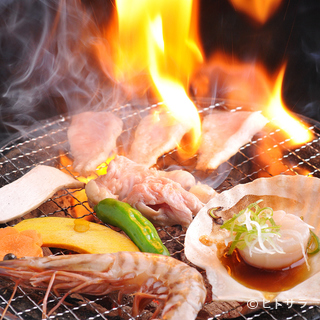 Grilled fragrantly on a charcoal grill in a spacious restaurant
