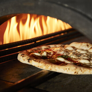 Authentic pizza baked in a special oven!