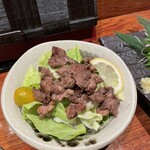 居酒屋 手羽揚げ いっぽ 掛川本店 - うら肉の塩焼き(チョット食べた写真)