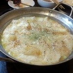 ワインとクラフトビール はるばる - バケット入れてパングラタン風〆