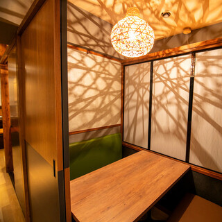 A modern Japanese dining room with fully private rooms