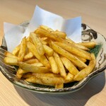 Potato fries flavored with bonito stock