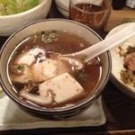 かんたろう - 鳥スープでいただく湯豆腐です。