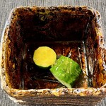 NOMI RESTAURANT - A cucumber that doesn't realize it's being cut