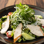 Caesar salad with smoked chicken and mizuna