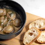 Scallop Ajillo with anchovies and buttery baguette