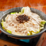 Herb pork from Makkari village steamed on a ceramic plate