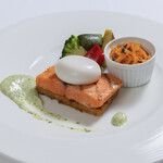 Grilled salmon and rosti with poached eggs and herb sauce