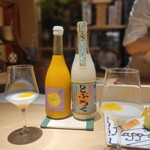 鮨 かぐら - 最後のペアリングのお酒 ブロック とみかんジュース飲ませた 甘いかと思いきや すっきりしていたカクテルっぽいお酒