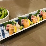 かんじんかなめ - 枝豆と刺身 帆立は軽く炙ってありました