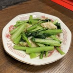 Stir-fried greens, squid and salt with garlic
