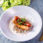 Lentils stewed in homemade soy milk - served with sausages