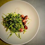 Street food style stir fried gizzard and pea sprouts