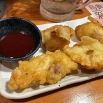 Torikizoku - 鳥天　※鳥ももの天ぷらです。これも「ブライニング」してるのかな？ジューシー、衣がかなりパリパリで美味しい。これに甘酸っぱい梅肉ソースがよく合います。おすすめです！