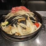 炭焼き 成吉思汗いし田 - マトンロール(調理中)