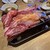 十勝帯広大衆食堂 とかち晴ル - 料理写真:名物！北海道産牛炙り肉寿司（二貫）