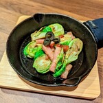 Sauteed Brussels sprouts and bacon with anchovies