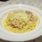 ピッツェリア - パスタAセット（税込み１４０８円）の半熟卵のカルボナーラ