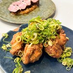 東京ギョーザスタンド ウーロン - 九条葱の油淋鶏