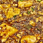 かつぎや - しっかり辛くて香りも抜群　ほろほろと崩れる豆腐の食感が堪らない