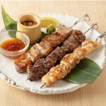 Rakuzo's 3 kinds of meat on a large skewer