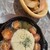 CONA - 料理写真:丸ごとカマンベールとトマトのアヒージョ。バケットもサクサク。