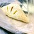 フレッシュベーカリー神戸屋  - 料理写真:あまり色がないので”映え”てはいませんが、レモンの香りが爽やかに香るおいしいパイでした。膝にのせたカーディガンが左下に…