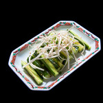 Various types of green onion and cucumber
