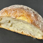 Petit Riche - 料理写真:もっちり古代パン（ハーフ）　110円（税込）