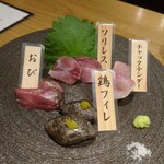 みやざき地頭鶏炭火焼 Kutsurogi 三四郎 - みやざき地鶏頭 炙り4種