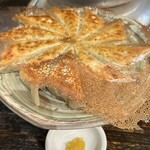 餃子・とんちゃん専門店 塚ちゃん餃子 - 餃子10個　¥600 柚子こしょうトッピング¥100